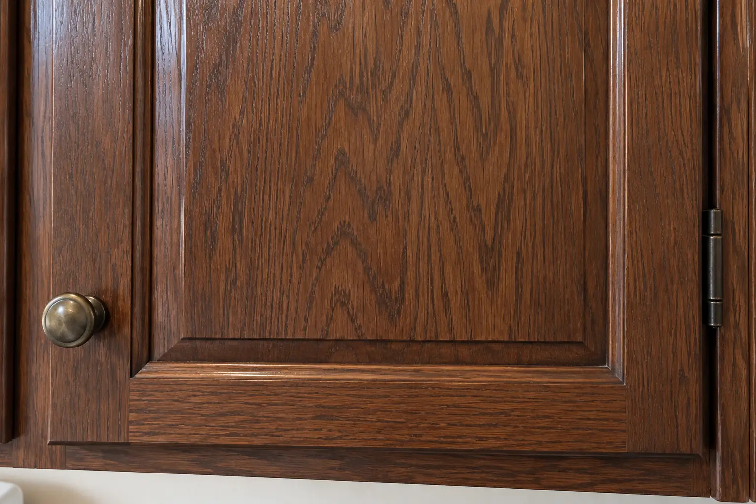 Cabinet Refinishing & Staining in a postwar ranch / cape cod / bi-level — detail