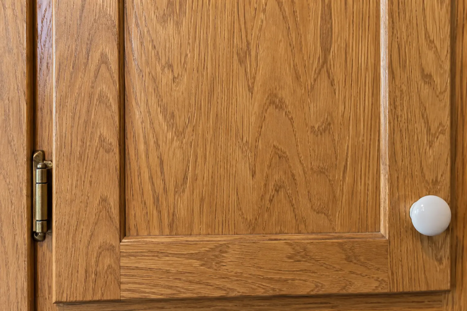 Cabinet Refinishing & Staining in a postwar ranch / cape cod / bi-level — detail