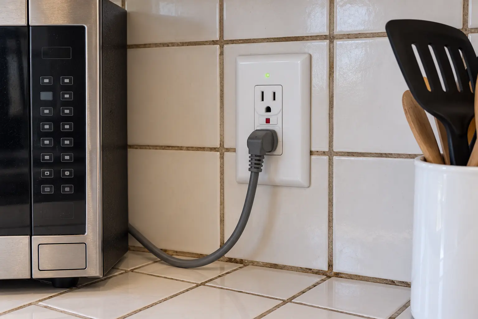 Kitchen Electrical Work in a 1980s-1990s two-story colonial / tract house — detail