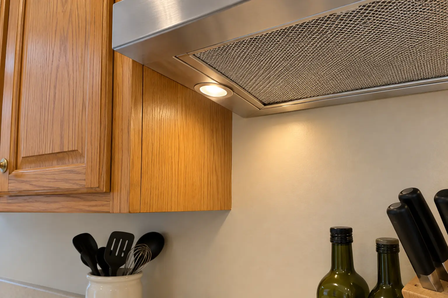 Range Hood Installation in a 1980s-1990s two-story colonial / tract house — detail