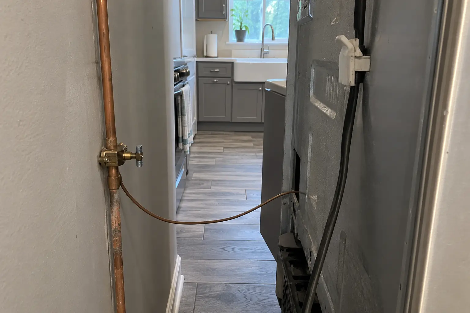 Appliance Water Line Installation in a 2000s new construction — before