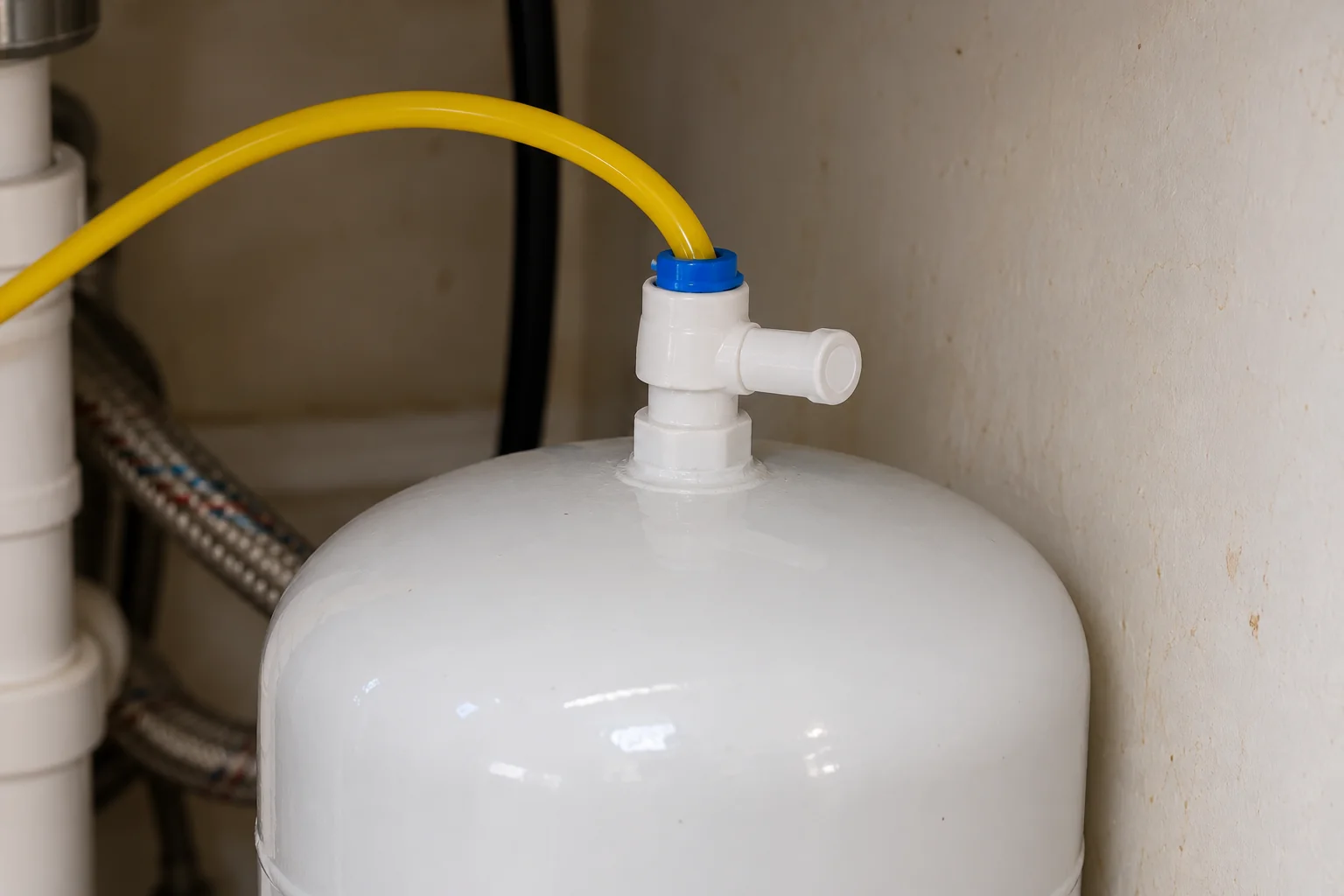 Under-Sink Water Filtration in a 1980s-1990s two-story colonial / tract house — detail